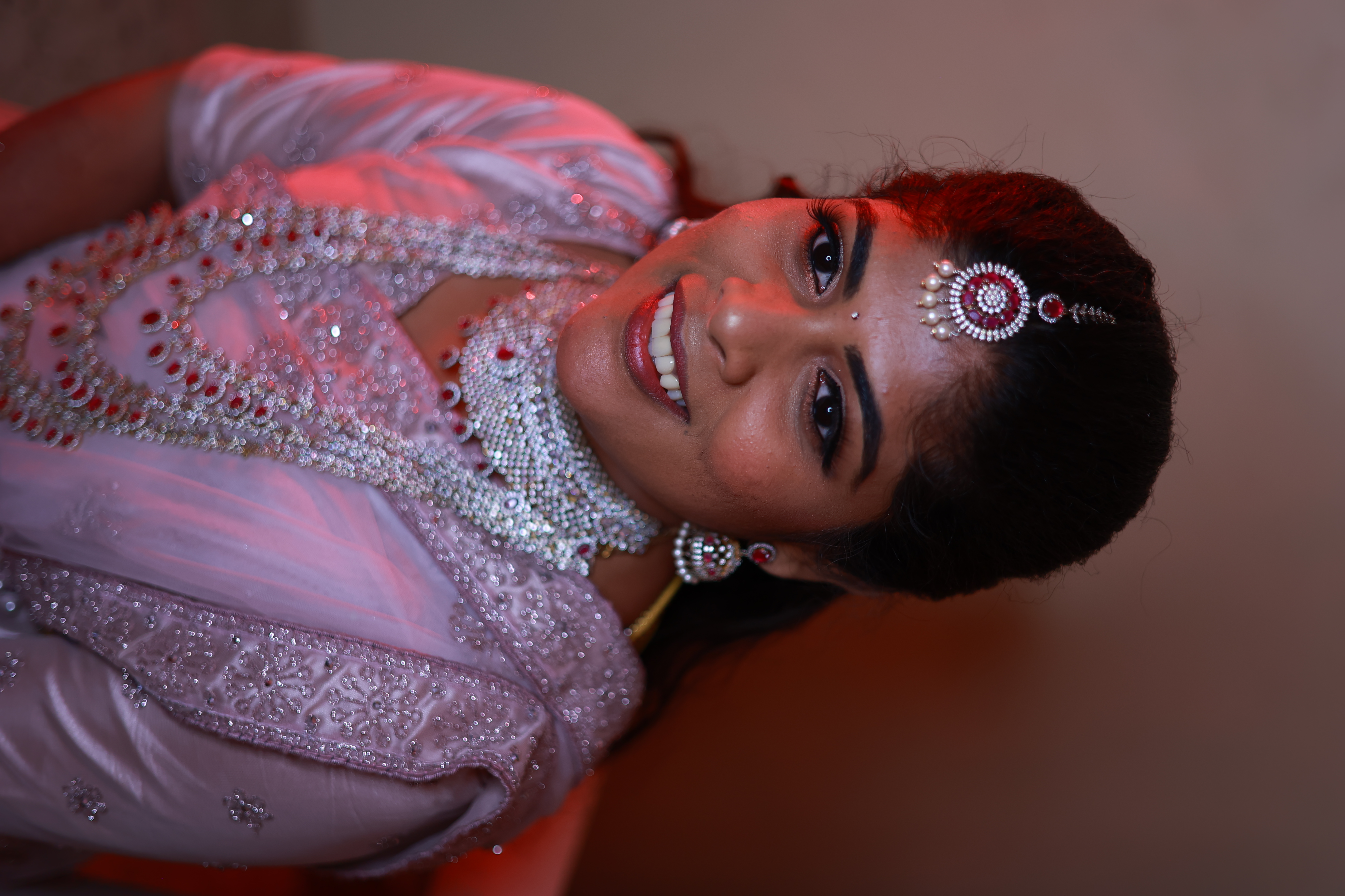 Couple with floral backdrop