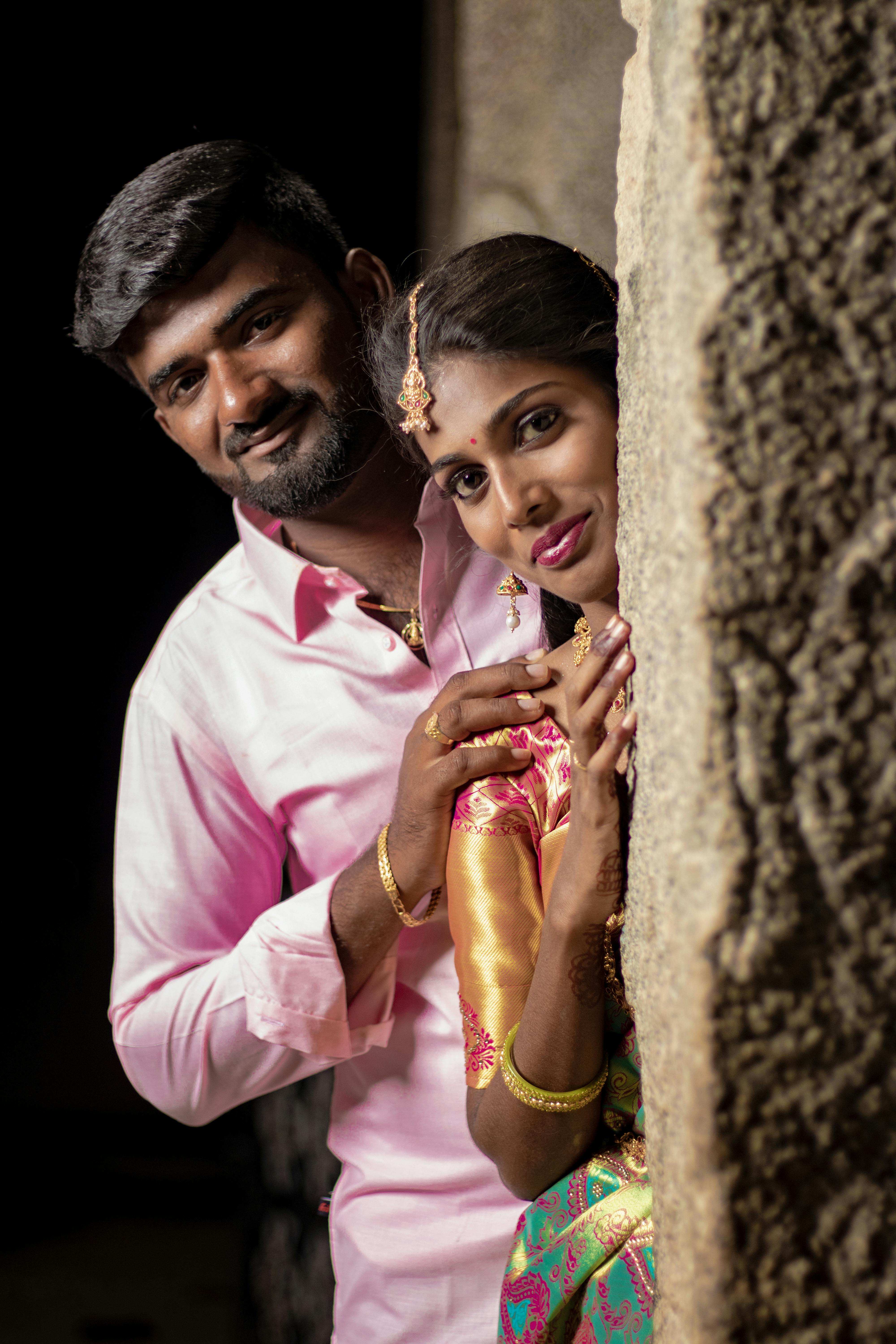Couple with floral backdrop